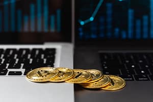 Bitcoins on laptop keyboard