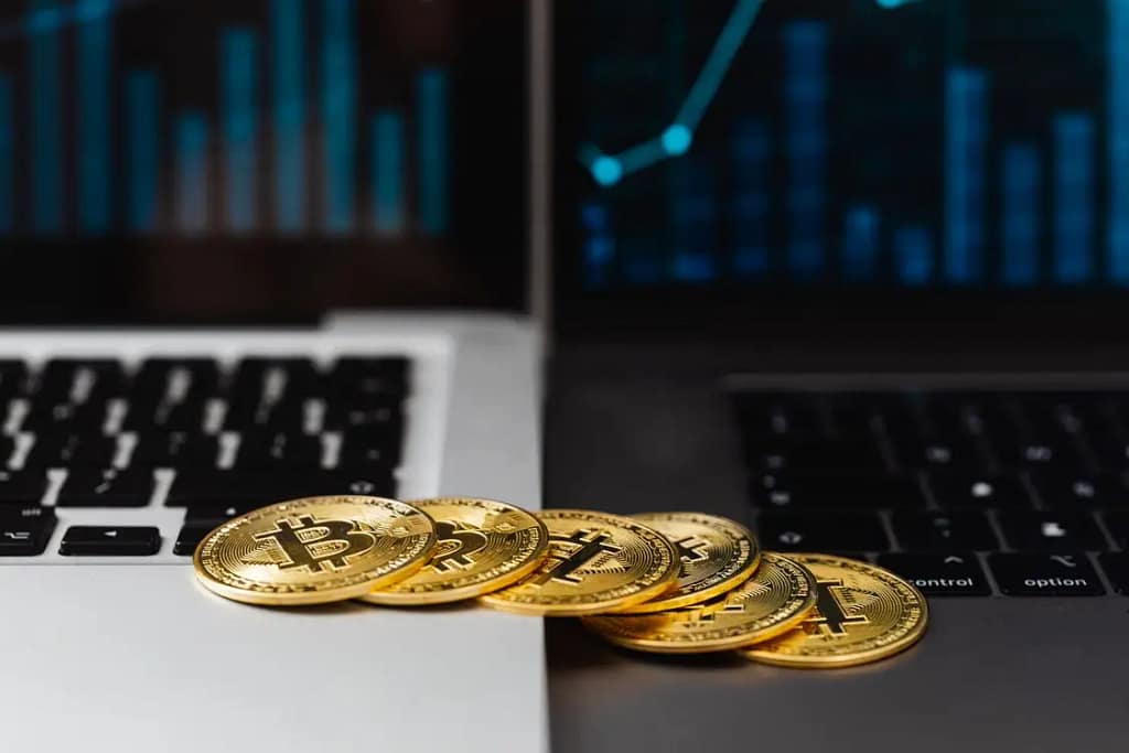 Bitcoins on laptop keyboard