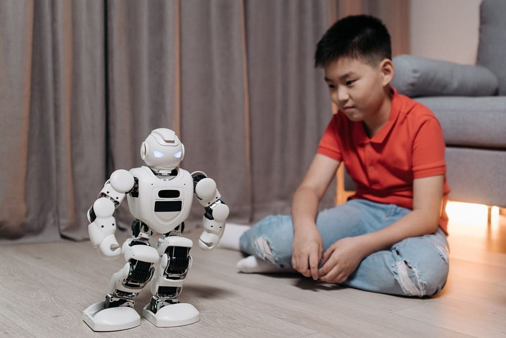 Boy watching AI robot