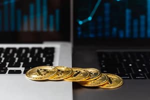 Bitcoins on laptop keyboard